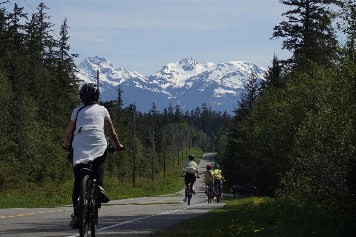 1200x800 Juneau rainforest ebike girl bike mountain stunning