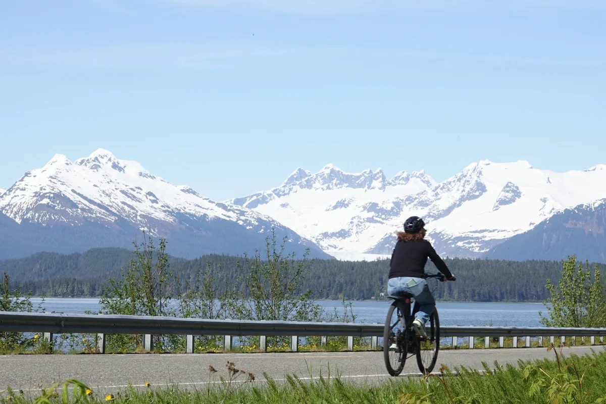 Best Juneau Shore Excursions for Cruise Passengers: Top Tours 3 1200x800 Rainforest ebike mountains ocean woman bike ride