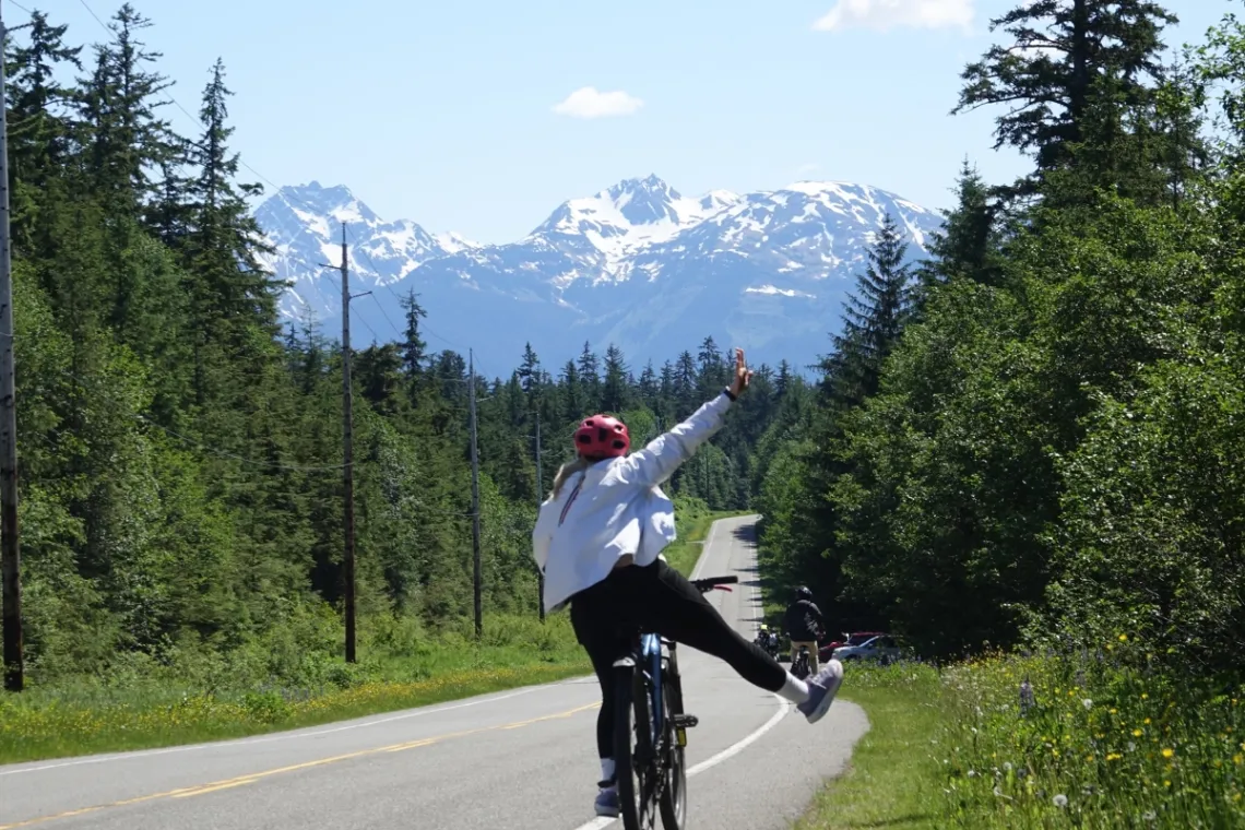 The Quiet Side of Juneau: Why E-Bike Tours Beat the Van 2 Juneau rainforest ebike mountain view happy girl fun tour 1200x800 1